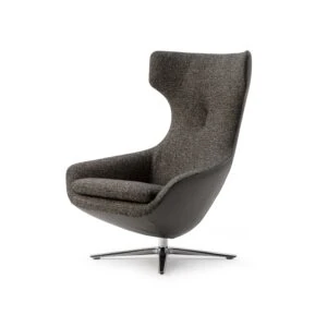 Leolux Caruzzo Primo schuin aanzicht leder stof combinatie met chorme poot